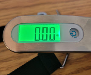 An electronic weigh scale showing 0.00 kgs