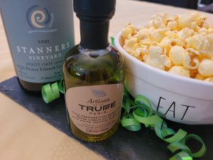 Popcorn tossed with truffle oil and paired with Pinot Gris